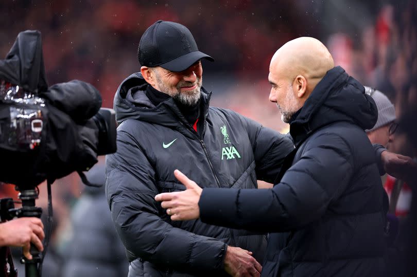 Jurgen Klopp and Pep Guardiola shake hands before Liverpool's clash with Manchester City