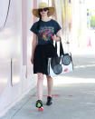 <p>Krysten Ritter keeps the sun at bay by sporting sunglasses and a hat while out and about in L.A. on June 13. </p>