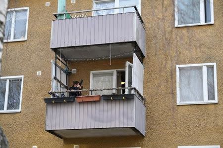 A police photographer takes pictures during a house search as part of the investigation after the terror attack in Drottninggatan where several people were killed and injured after a truck crashed into a department store Ahlens, in an apartment in Varberg south west of Stockholm, Sweden, April 8, 2017. Maja Suslin/TT News Agency via REUTERS