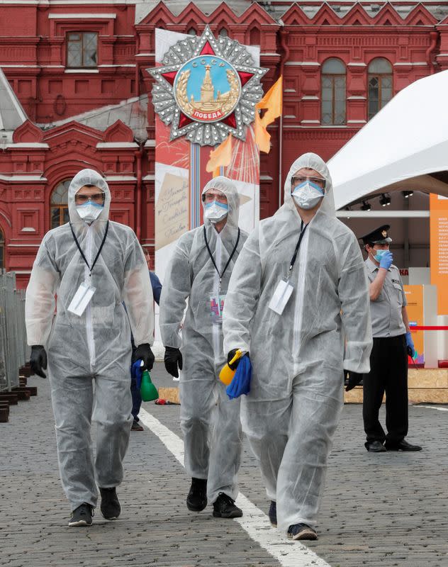 Specialists work during the annual Red Square Book Fair in central Moscow