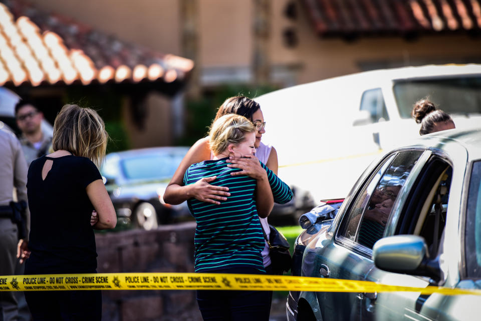 People on Wednesday pick up their cars from the venue where the Las Vegas mass shooting occurred. (Photo: Salwan Georges/The Washington Post via Getty Images)