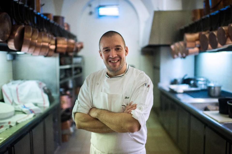 Guillaume Gomez, the new head chef at the Elysee Palace, poses for photographers in the kitchens at the Elysee Palace in Paris, France, Thursday, Oct. 31, 2013. Guillaume Gomez replaces France’s presidential chef, Bernard Vaussion, 60, who retired after four decades of culinary service. (AP Photo/Martin Bureau, pool)