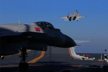 A live-fire drill using an aircraft carrier is seen carried out in the Bohai sea, China, December 14, 2016. 2016. REUTERS/Stringer