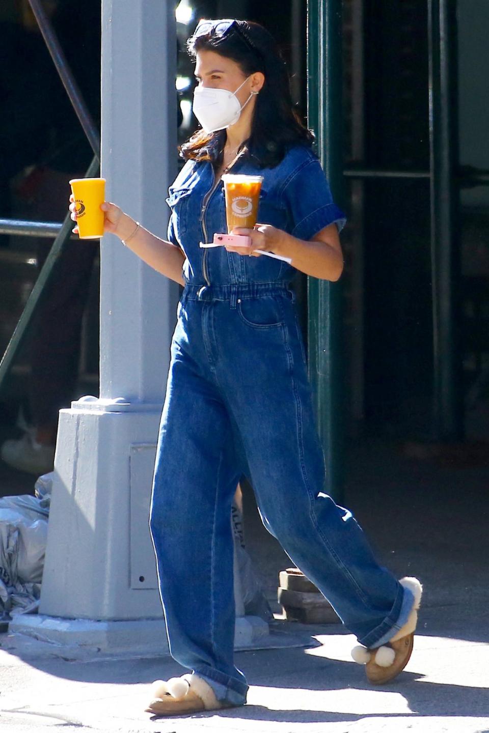 <p>New mom Hilaria Baldwin grabs two coffees in N.Y.C. on Thursday. </p>