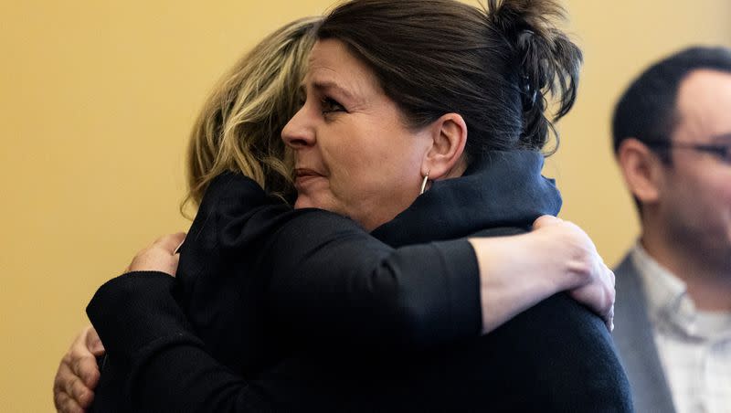 Marlesse Jones, right, director of the Victim Services Commission of the Utah Commission on Criminal and Juvenile Justice, hugs Leah Moses after Moses spoke during the Utah Domestic Violence Coalition Advocacy Day at the Capitol in Salt Lake City on Monday, Feb. 5, 2024.