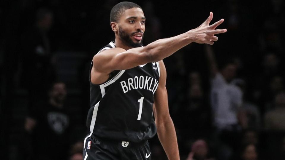 Mar 29, 2023; Brooklyn, New York, USA; Brooklyn Nets forward Mikal Bridges (1) celebrates after making a three point shot in the first quarter against the Houston Rockets at Barclays Center.