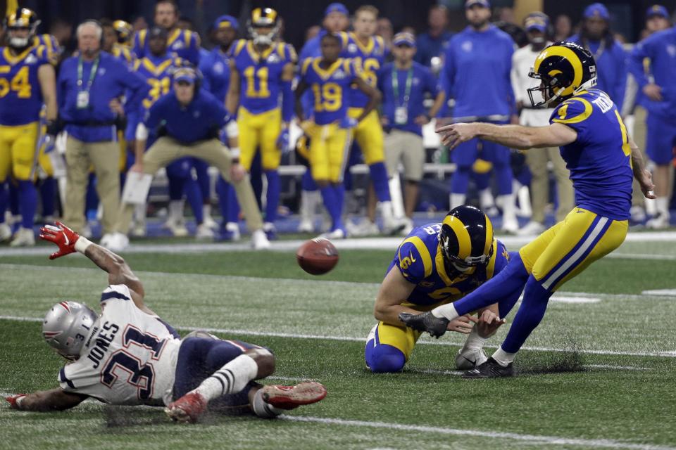 oLos Angeles Rams' Greg Zuerlein (4) kicks a field goal as Johnny Hekker (6) holds during the second half of the NFL Super Bowl 53 football game Sunday, Feb. 3, 2019, in Atlanta. At left is New England Patriots' Jonathan Jones (31). (AP Photo/Mark Humphrey)