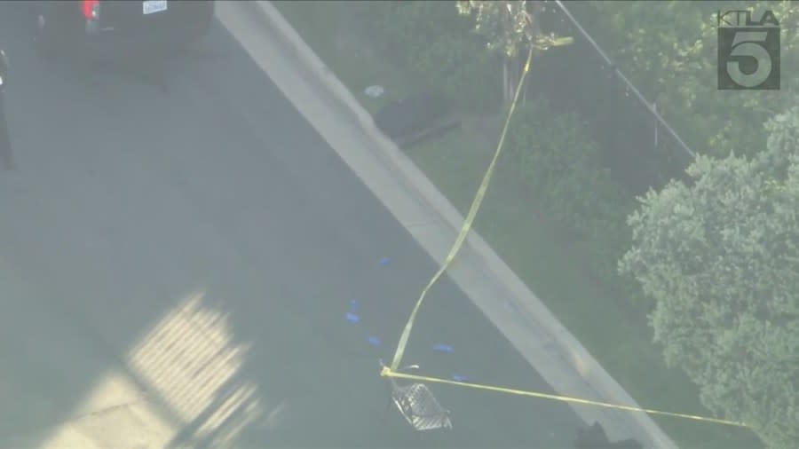 Law enforcement officials outside the scene of a possible home invasion in Newport Beach, CA on April 16, 2024. (Sky5)