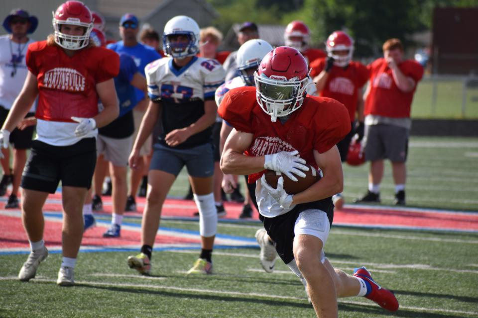 Martinsville's Brayden Shrake advances up field during the Artesians' scrimmage with Indian Creek on June 22, 2022.