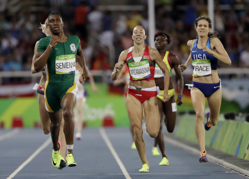 South Africa's Caster Semenya, left, Belarus' Marina Arzamasova, center, and United States' Kate Grace compete in a women's 800-meter semifinal during the athletics competitions of the 2016 Summer Olympics at the Olympic stadium in Rio de Janeiro, Brazil, Thursday, Aug. 18, 2016, she is not transgender. (AP Photo/David J. Phillip)