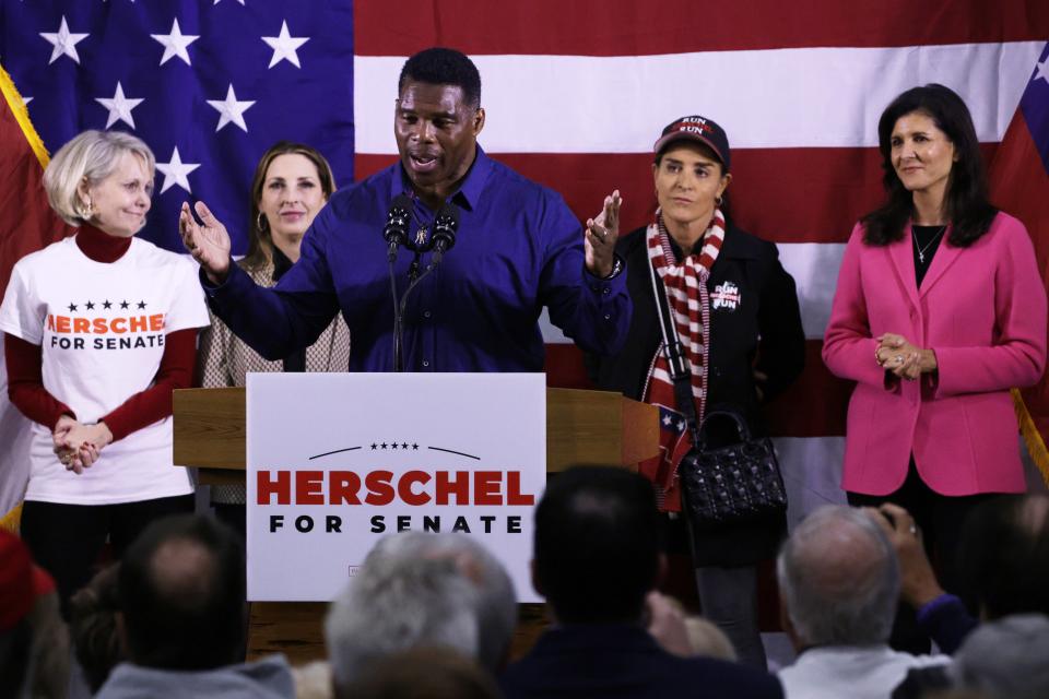 Georgia Republican Senate candidate Herschel Walker speaks during a campaign rally on 5 December 2022 in Kennesaw, Georgia (Getty Images)