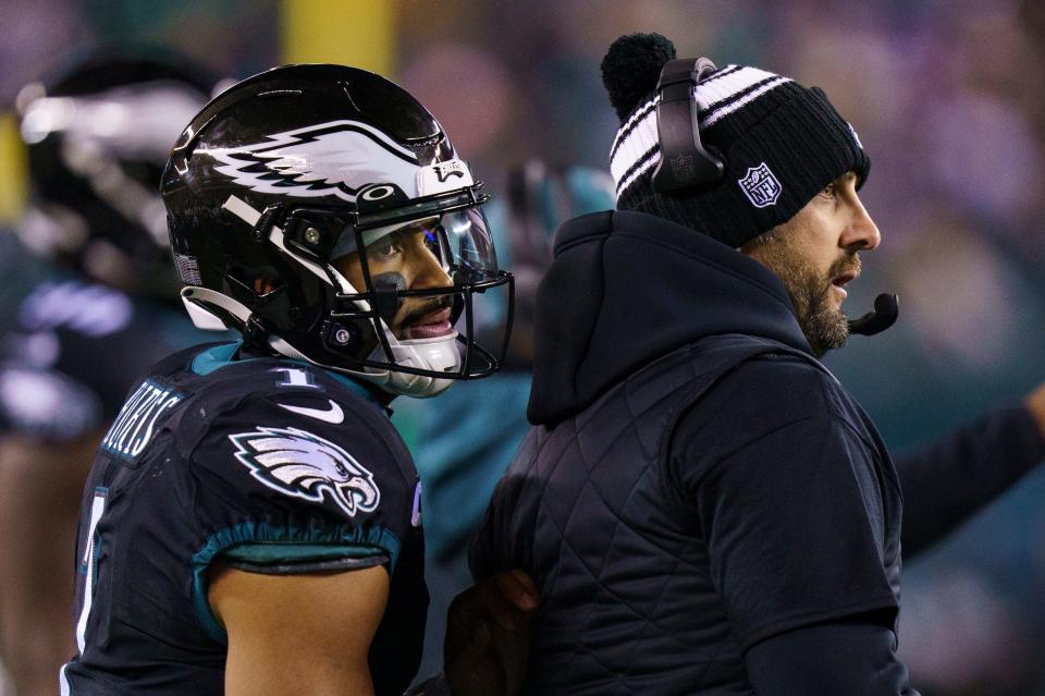 Philadelphia Eagles quarterback Jalen Hurts (1) looks on with head coach Nick Sirianni, right, during the game against the New York Giants on Sunday, Jan. 8, 2023, in Philadelphia.