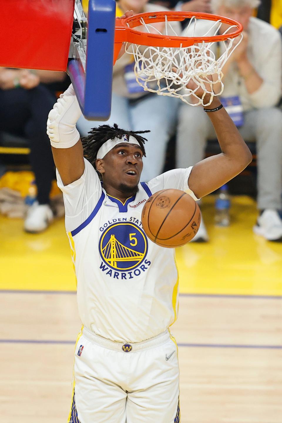 Golden State Warriors center Kevon Looney dunks against the Boston Celtics during the first half of Game 2 of the NBA Finals.