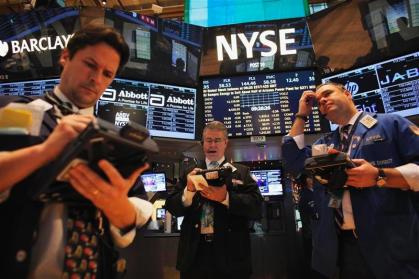 Traders at the New York Stock Exchange:  Credit Reuters