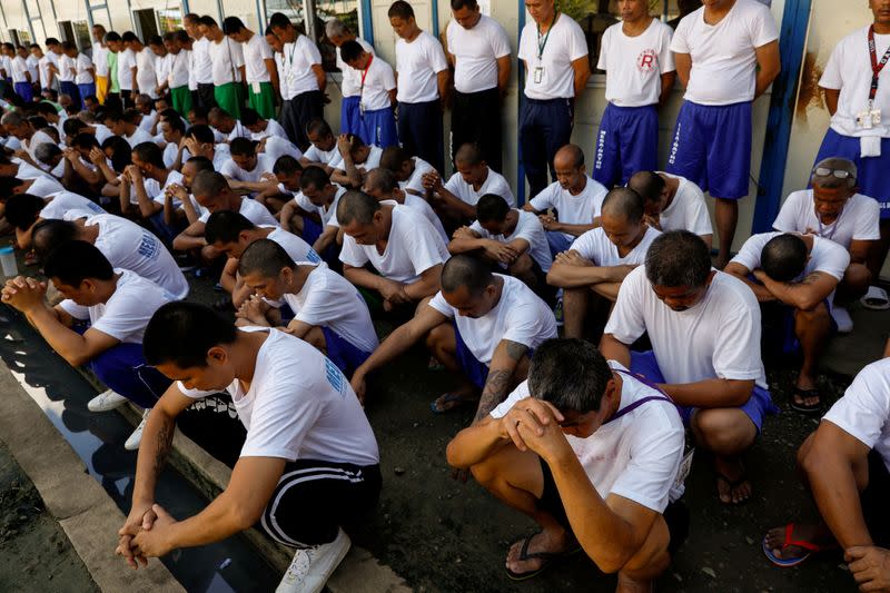 Drug rehab patients gather for a head count at the Mega Drug Abuse Treatment and Rehabilitation Center, in Nueva Ecija province, north of Manila