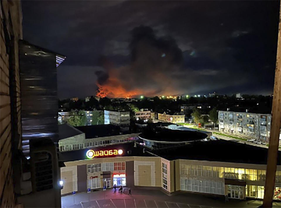 This image made from a social media and and provided by Ostorozhno Novosti shows smoke billowing over the city and a large blaze in Pskov, Russia, on Aug. 29, 2023. Russian officials accused Ukraine of targeting six Russian regions early Wednesday in what appeared to be the biggest drone attack on Russian soil since Moscow sent troops into Ukraine 18 months ago. (Ostorozhno Novosti via AP)