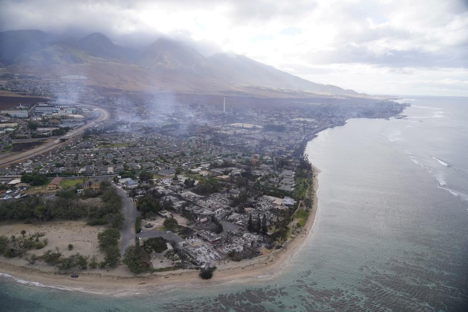 A wasteland of burned-out homes and obliterated communities is left on Aug. 10, 2023, in Lahaina, Hawaii, following a stubborn blaze. Experts say the fires are likely to transform the landscape in unwanted ways, hasten erosion, send sediment into waterways and degrade coral that’s critically important to the islands, marine life and people who live near it. | Rick Bowmer, Associated Press