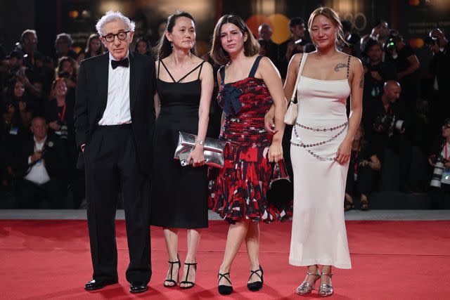 <p>TIZIANA FABI/AFP via Getty </p> US director Woody Allen (L) and Soon-Yi Previn along with Bechet Allen and Manzie Allen attend the red carpet of the movie "Coup de Chance" presented out of competition at the 80th Venice Film Festival on September 4, 2023 at Venice Lido.