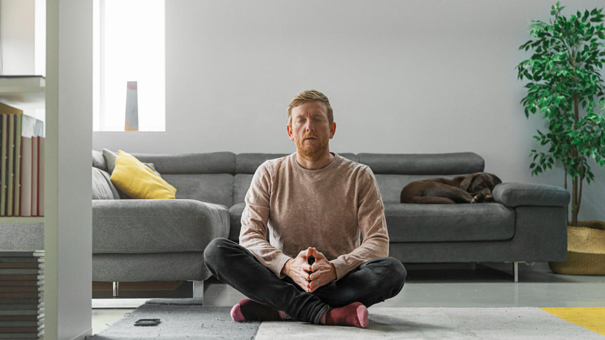  A man meditating. 