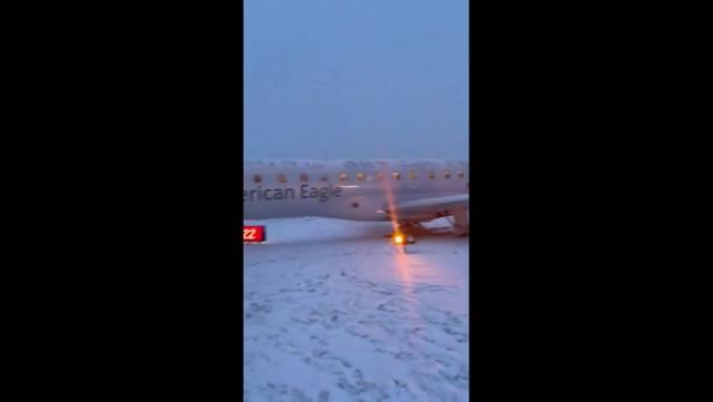 American Airlines plane slips off snowy runway after New York landing