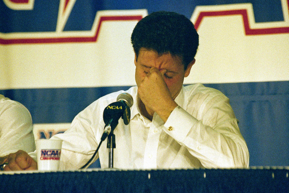 FILE - In this March 28, 1992, file photo, Kentucky head coach Rick Pitino reacts at a press conference after Duke beat Kentucky in overtime 104-103 in an East Regional Final NCAA college basketball game in Philadelphia. (AP Photo/Charles Rex Arbogast, File)