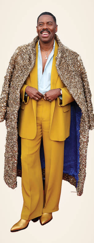 Colman Domingo at the Critics Choice Awards in a gold coat and mustard suit by Valentino.