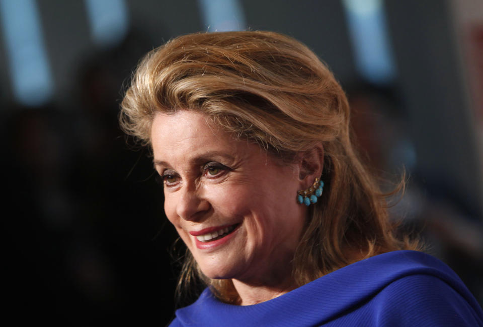 French actress Catherine Deneuve arrives for the Film Society of Lincoln Center's 39th annual Chaplin Award Gala at Alice Tully Hall, Monday, April 2, 2012 in New York. (AP Photo/Jason DeCrow)