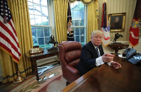 U.S. President Donald Trump speaks during an interview with Reuters in the Oval Office of the White House in Washington, U.S., April 27, 2017. REUTERS/Carlos Barria