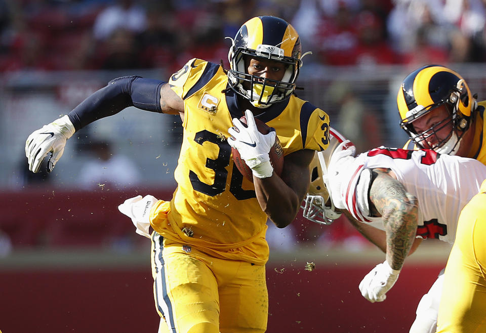 Los Angeles Rams running back Todd Gurley II (30) runs against the San Francisco 49ers during the second half of an NFL football game in Santa Clara, Calif., Sunday, Oct. 21, 2018. (AP Photo/Tony Avelar)