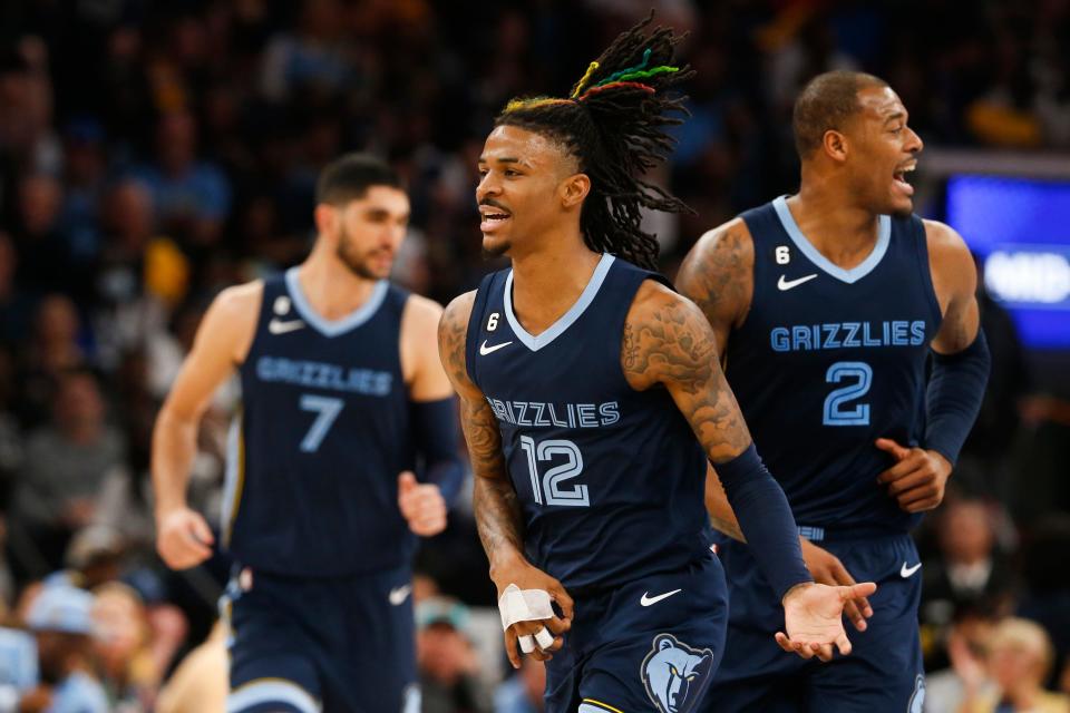 Grizzlies' Ja Morant (12) imitates playing guitar as a celebration after scoring during Game 1 between the Memphis Grizzlies and LA Lakers in their first round NBA playoffs series on April 16, 2023 at FedExForum. 