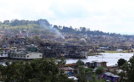 Damaged buildings are seen after government troops cleared the area from pro-Islamic State militant groups inside a war-torn area in Marawi city, southern Philippines October 23, 2017. REUTERS/Romeo Ranoco