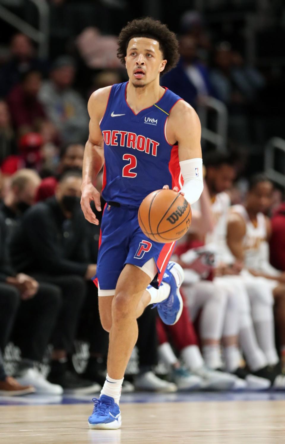 Detroit Pistons guard Cade Cunningham brings the ball up court against the Cleveland Cavaliers on Sunday, Jan. 30, 2022 at Little Caesars Arena.