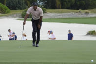 Tiger Woods studies his putt at the third green during the first round of the Hero World Challenge PGA Tour at the Albany Golf Club, in New Providence, Bahamas, Thursday, Nov. 30, 2023. (AP Photo/Fernando Llano)
