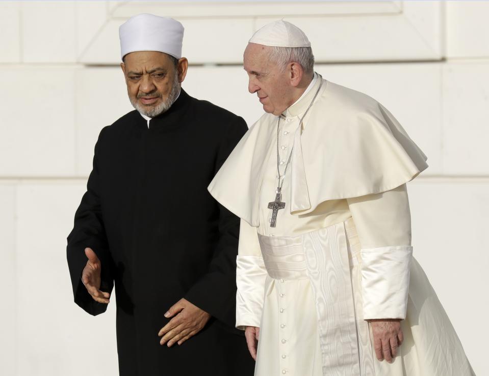 Sheikh Ahmed el-Tayeb, the grand imam of Egypt's Al-Azhar, left, welcomes Pope Francis ahead of a private meeting with members of the Muslim council of elders, at the Grand Mosque of Sheikh Zayed, in Abu Dhabi, United Arab Emirates, Monday, Feb. 4, 2019. Francis' speech to the gathering of faith leaders on Monday evening is to be the highlight of his brief, 40-hour visit to Abu Dhabi, the first to the Arabian Peninsula by a pope. (AP Photo/Andrew Medichini)