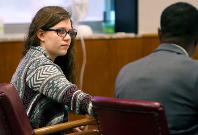 <p>C.T. Kruger /Milwaukee Journal-Sentinel / AP, Pool</p> Anissa Weier passes a note to defense attorney Joseph Smith Jr. during closing arguments in her case on September 15, 2017.