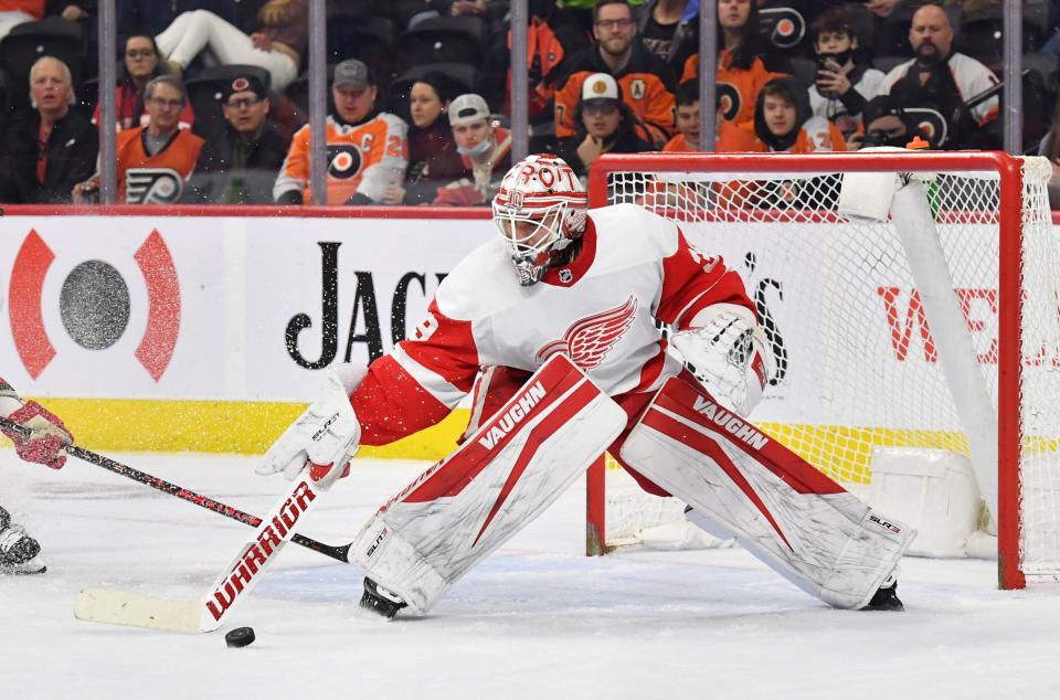 Detroit Red Wings goaltender Alex Nedeljkovic (39) clears the puck against the Philadelphia Flyers during the second period at Wells Fargo Center in Philadelphia on Wednesday, Feb. 9, 2022.