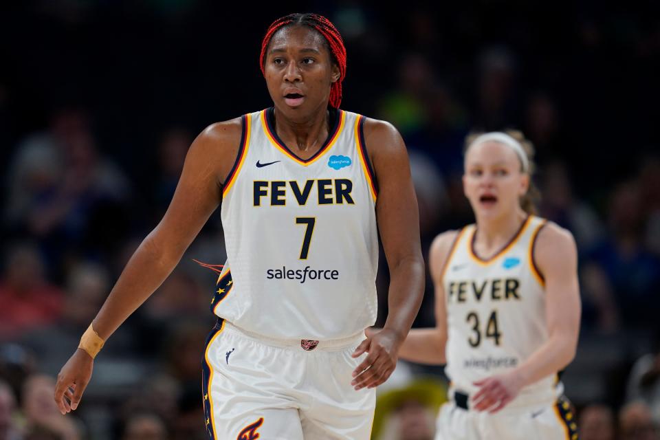 Indiana Fever forward Aliyah Boston (7) walks on the court during the first half of the team's WNBA basketball game against the Minnesota Lynx, Friday, June 9, 2023, in Minneapolis. (AP Photo/Abbie Parr)