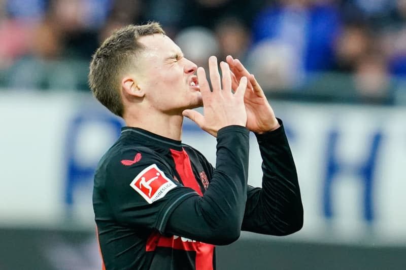 Leverkusen's Florian Wirtz reacts during the German Bundesliga soccer match between SV Darmstadt 98 and Bayer Leverkusen at the Merck-Stadion am Boellenfalltor. Uwe Anspach/dpa