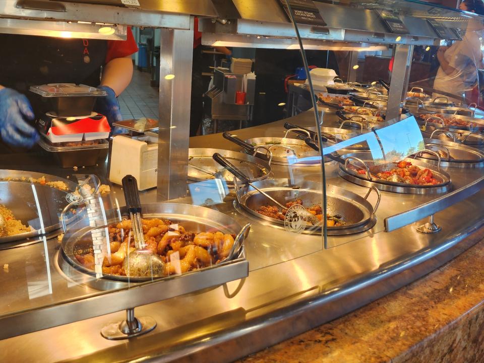 Bowls of food at counter at Panda Express