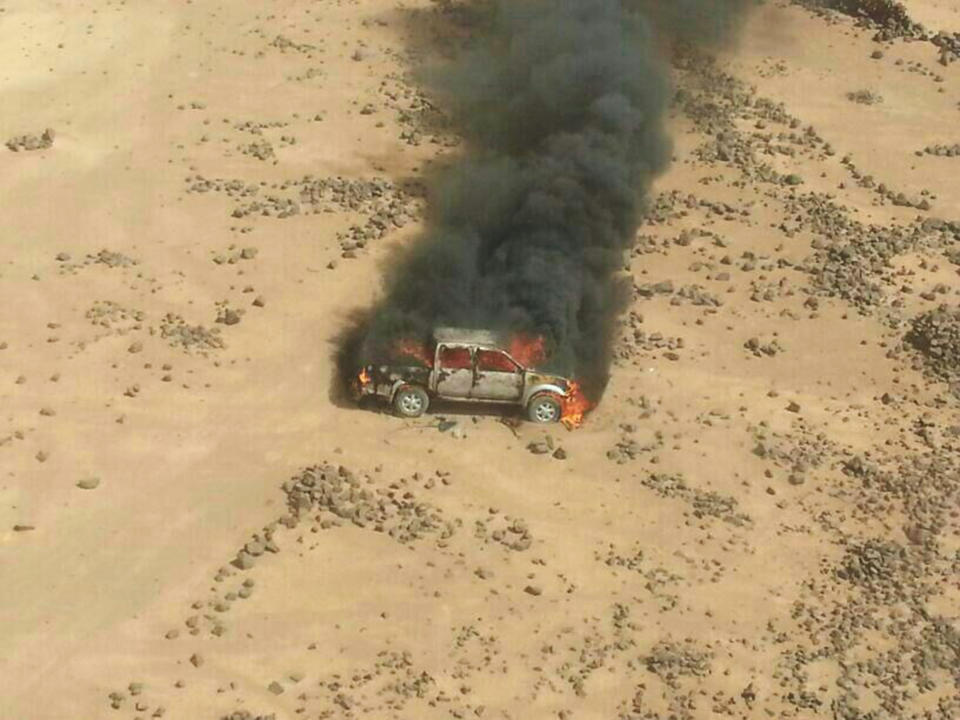 This aerial photo shows a truck burning after a Jordanian air strike on a convoy at the border between Jordan and Syria on Wednesday, April 16, 2014. Jordanian military warplanes struck a convoy of vehicles as they were trying to enter Jordan from Syria, the army said in a statement Wednesday, in an unusual move at a time of tensions between the desert kingdom and Damascus.(AP Photos/Ammonnews)