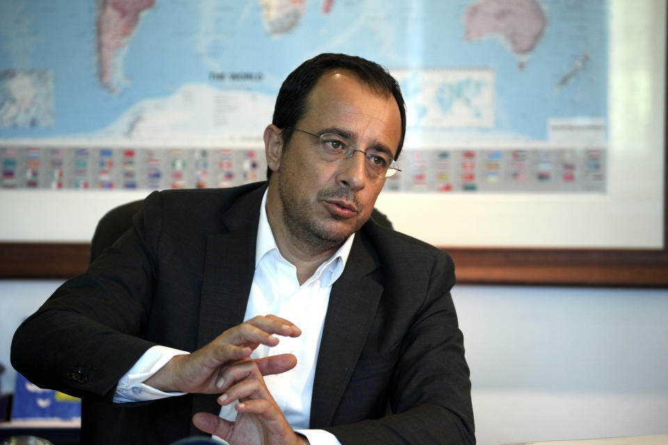 Cyprus' foreign minister Nikos Christodoulides speaks with the Associated Press during an interview at his office in Nicosia, Cyprus, Wednesday, Aug. 5, 2020. Christodoulides says the European Union must do more to fill a power vacuum in the eastern Mediterranean brought on by a perceived U.S. disengagement from the region. (AP Photo/Giorgos Christoforou)