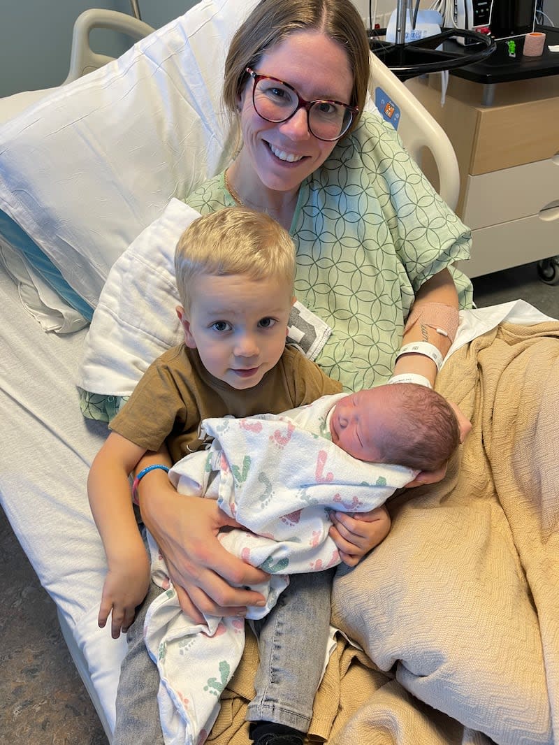 Emily Scott with her sons Colson and Elliott. She lost a baby at 31 weeks pregnancy before Elliott was born. | Scott family photo