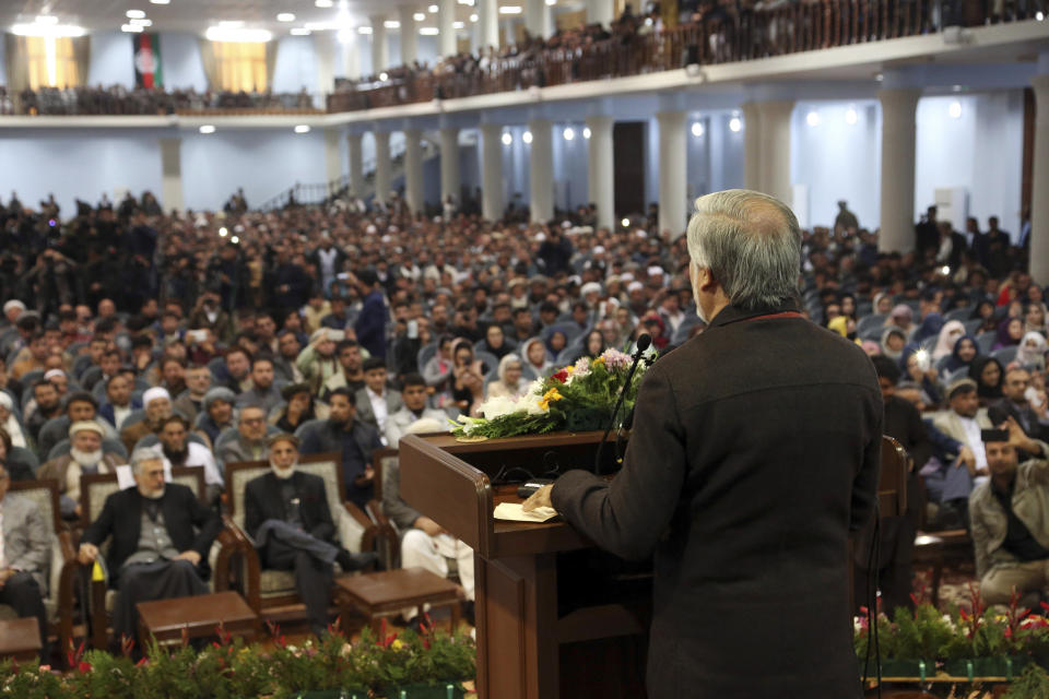 Afghan presidential candidate Abdullah Abdullah speaks to his supporters at a gathering in Kabul, Afghanistan, Sunday, Nov. 10, 2019. Abdullah has unilaterally withdrawn his team's election observers from an official recount of ballots ahead of long-delayed election results. (AP Photo/Rahmat Gul)