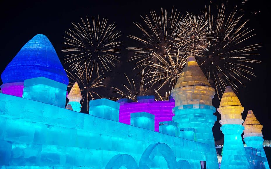 <p>Fireworks illuminate the night sky marking the opening of the Harbin Ice and Snow Festival to celebrate the new year.</p>