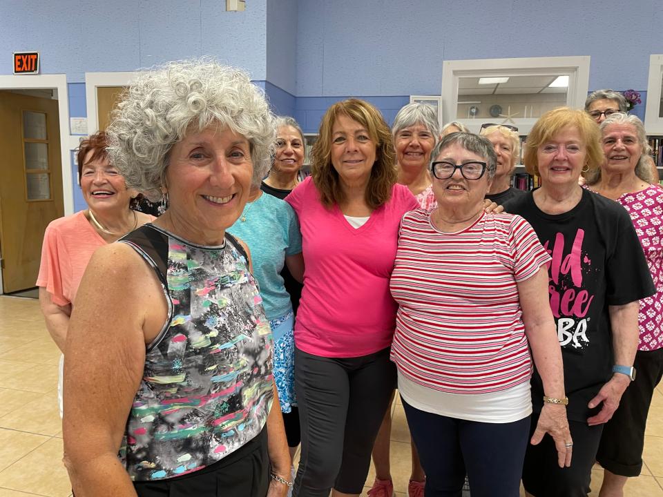 Rhonda DiCarlo (left) has been working with her dance class Shake It Up to perform flash mobs in town, like at Short Sands Beach earlier this month. Her class of performers call themselves the "Yorkettes" and say the group gives them a sense of community and a way to get active.