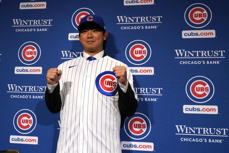 New Chicago Cubs pitcher Shōta Imanaga poses with his jersey during a news conference Friday, Jan. 12, 2024, in Chicago. The Japanese left-hander is expected to step right into the baseball team's rotation as it tries to return to the playoffs for the first time since 2020. (AP Photo/Nam Y. Huh)
