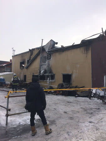 The charred exterior of a senior persons welfare facility is pictured in Sapporo, Hokkaido, Japan Februray 1, 2018, in this picture obtained from social media. @COMINVOICE/via REUTERS