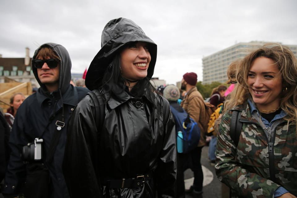 British model Daisy Lowe (C) joins climate change activists during a demonstration led by Extinction Rebellion activist group in central London, on October 7, 2019. - Extinction Rebellion has scheduled non-violent protests chiefly in Europe, North America and Australia over the next fortnight. (Photo by ISABEL INFANTES / AFP) (Photo by ISABEL INFANTES/AFP via Getty Images)