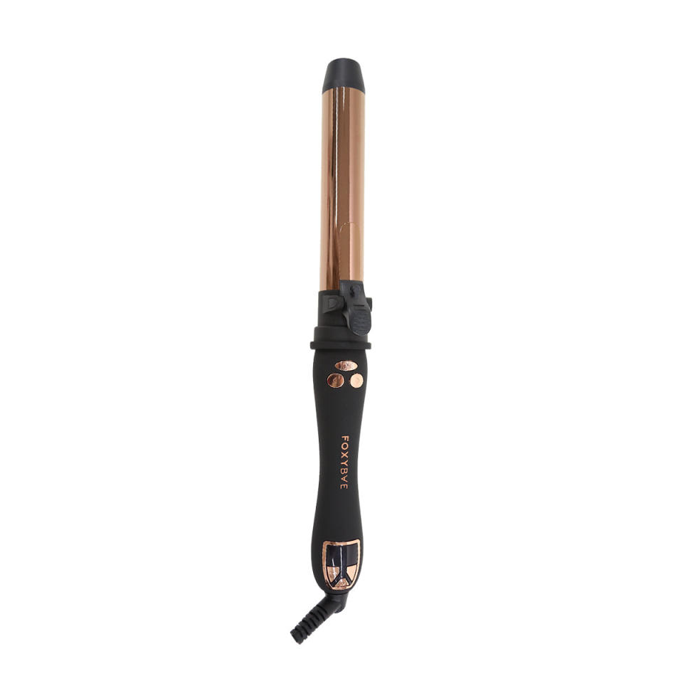 <p><a href="https://www.foxybae.com/collections/curling-wands/products/rose-gold-rotating-curler" rel="nofollow noopener" target="_blank" data-ylk="slk:Shop Now;elm:context_link;itc:0;sec:content-canvas" class="link ">Shop Now</a></p><p>Rose Gold Titanium Rotating Curler</p><p>foxybae.com</p><p>$45.95</p>