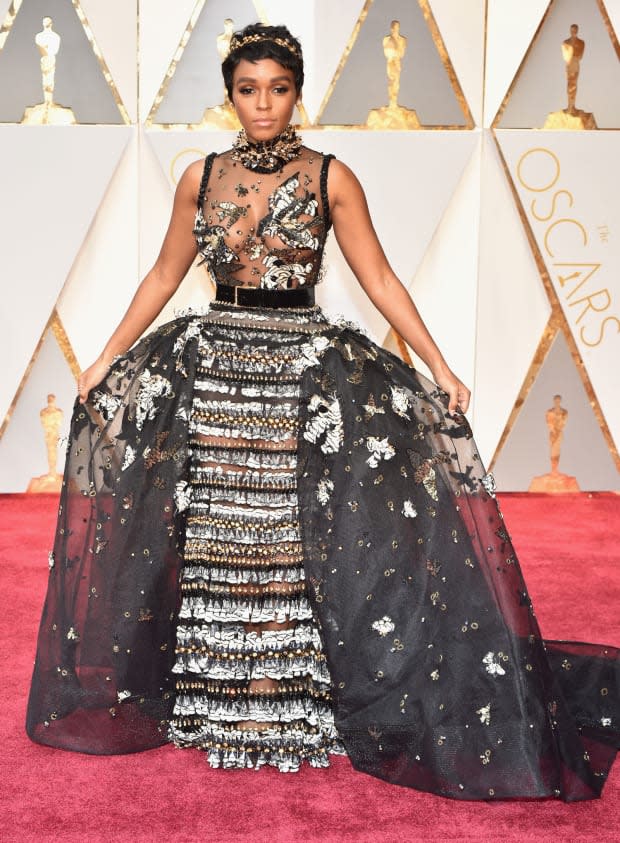 <p>All eyes were on the <em>Hidden Figures </em>and <em>Moonlight </em>actress in a fairy tale-inspired Elie Saab Haute Couture gown. Her stylist Maeve Reilly <a href="https://www.vogue.com/article/janelle-monae-oscars-2017-red-carpet-dress-elie-saab-couture" rel="nofollow noopener" target="_blank" data-ylk="slk:told Vogue;elm:context_link;itc:0;sec:content-canvas" class="link ">told <em>Vogue</em></a>that it was, “go big or go home” for the singer’s first Oscars appearance.</p>